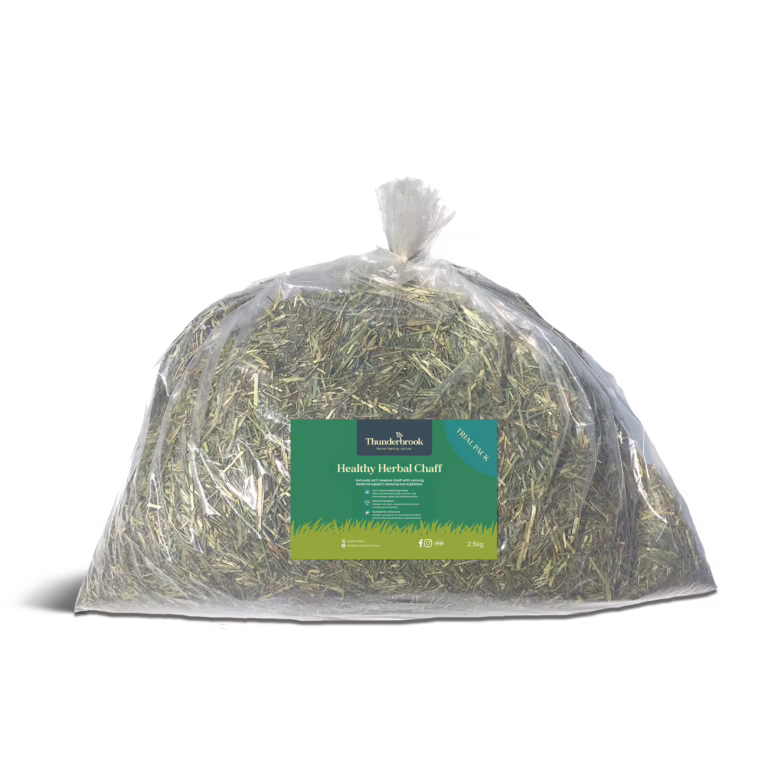 Transparent plastic bag filled with dried herbal chaff, labeled Thunderbrook Healthy Herbal Chaff (2.5 kg).